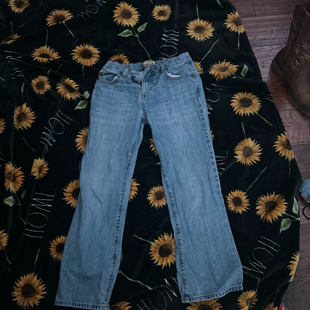 A pair of straight jeans, little bit darker thank light washed, old navy